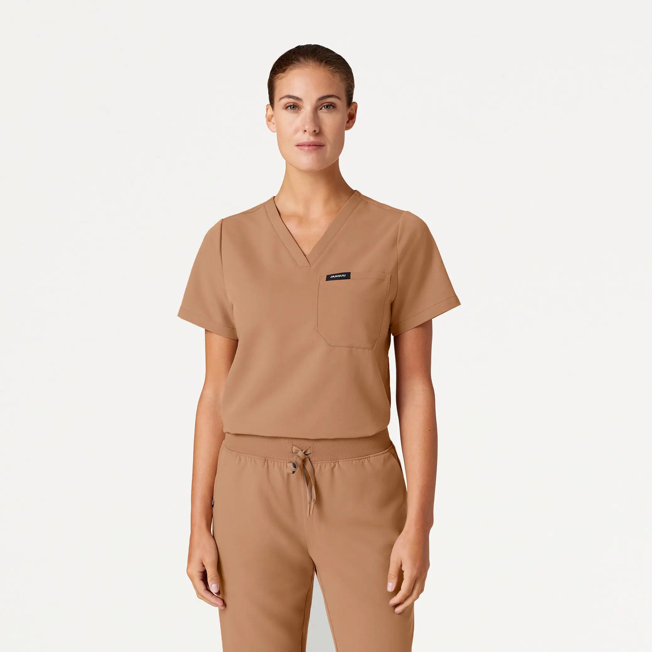 Jaanuu Women's Rhena Essential 1-Pocket Scrub Top - Trench